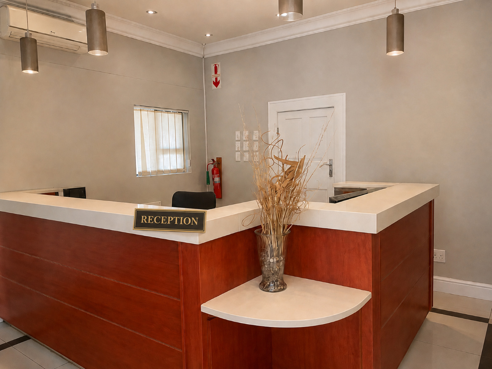 Le Pearl Boutique Hotel reception desk