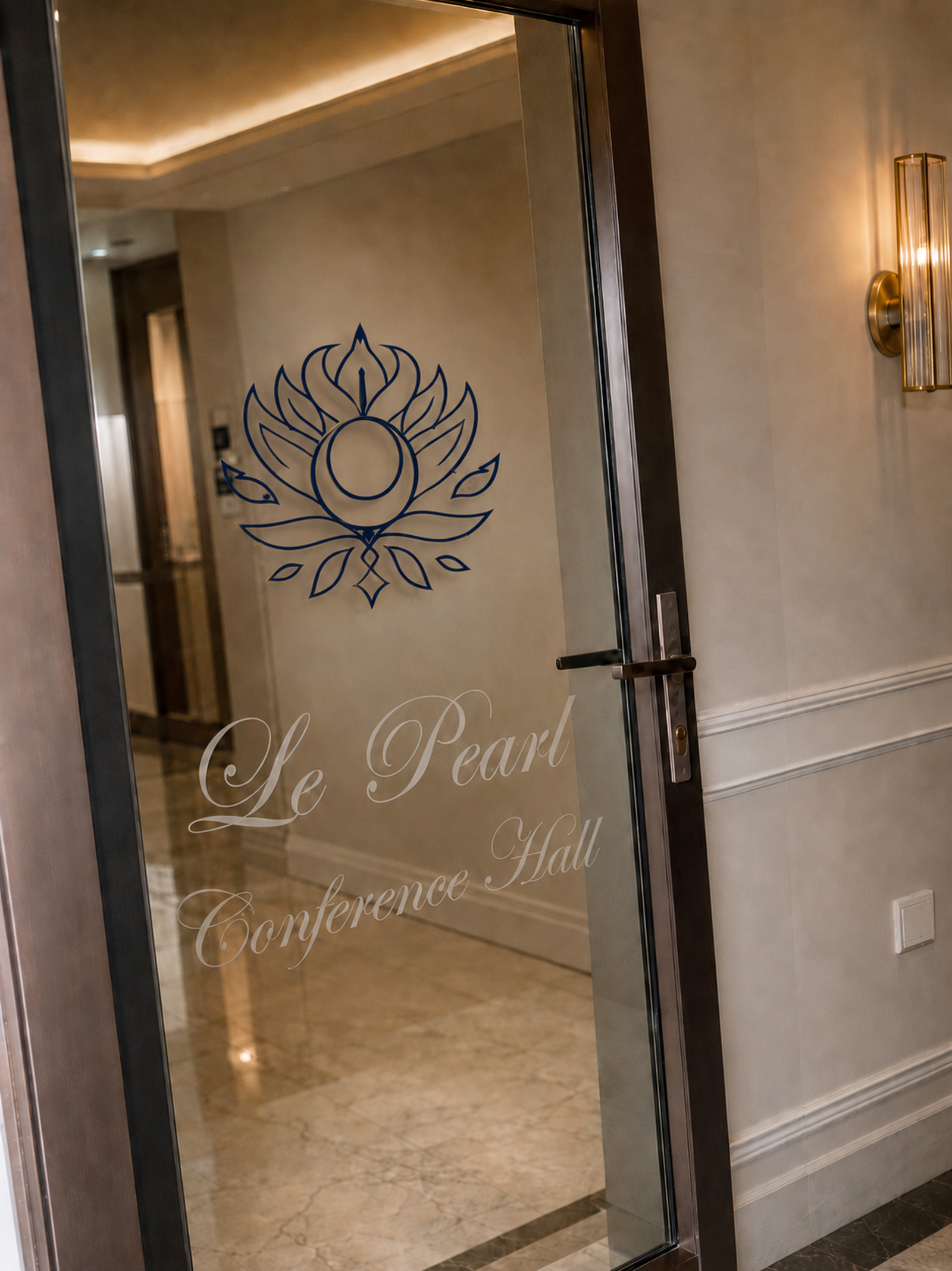 Le Pearl Conference Hall entrance with navy logo